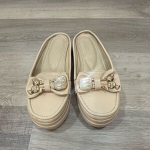 Elegant Cream Loafers with Gold Accents